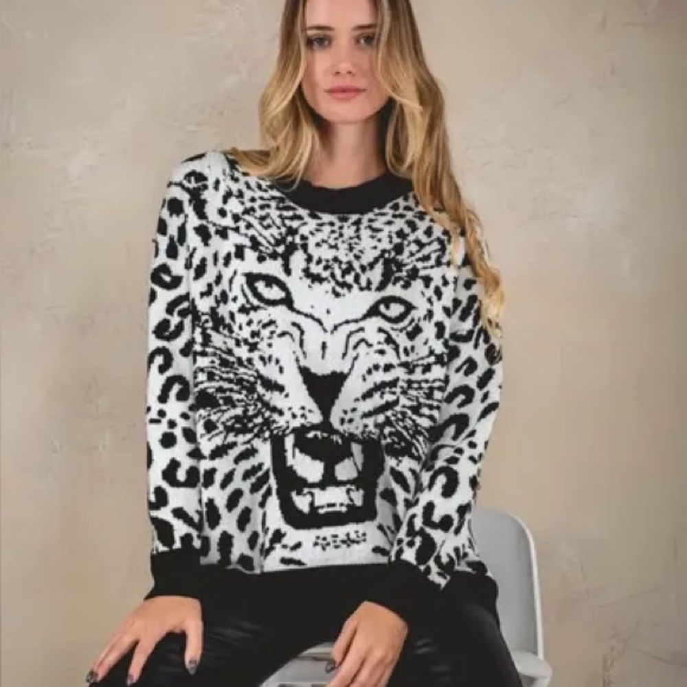 Gray and black knit sweater with leopard print